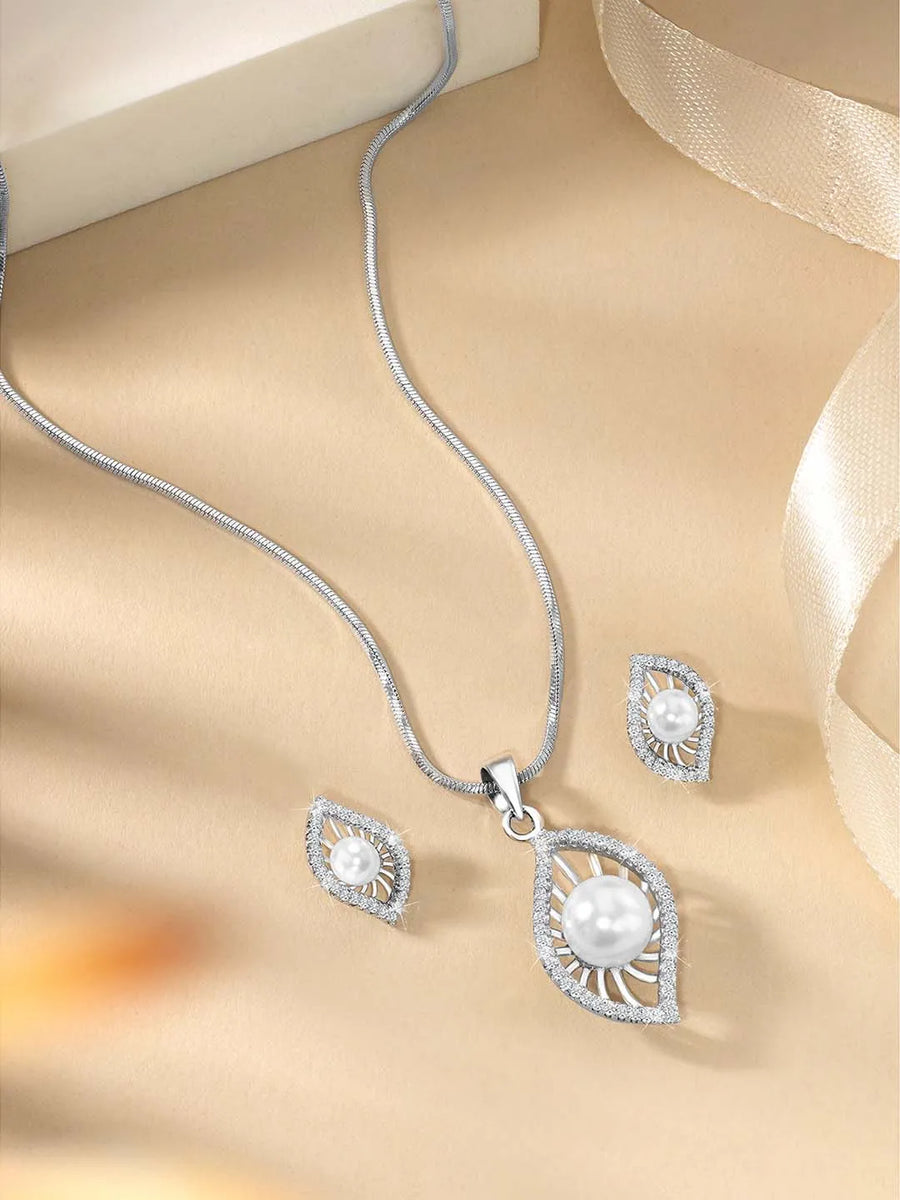 Leafy Luster Pearls and CZ Pendant Set. Silver plating pendant set with pair of earrings, in leaf shape embellished with pearl in centre.