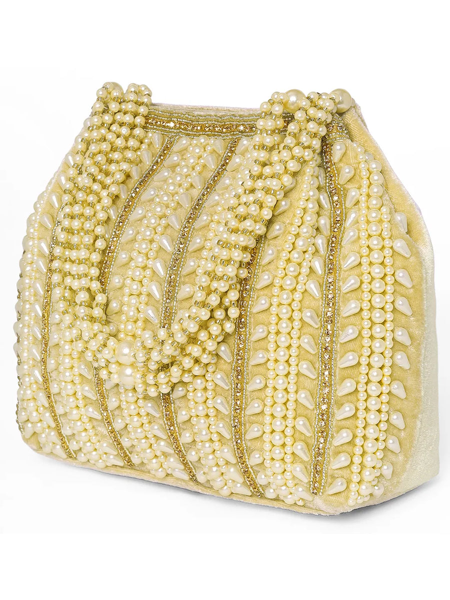 Gold potli bag named Traditional Pearl Cluster Potli Bag, featuring faux pearl detailing and soft fabric texture | Peora
