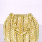 Gold potli bag named Traditional Pearl Cluster Potli Bag, featuring faux pearl detailing and soft fabric texture | Peora

