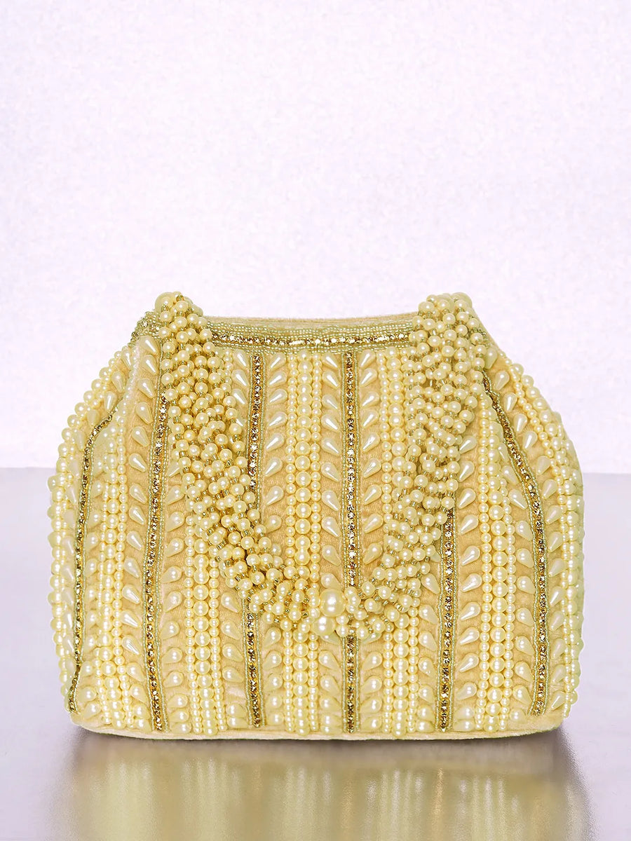 Gold potli bag named Traditional Pearl Cluster Potli Bag, featuring faux pearl detailing and soft fabric texture | Peora
