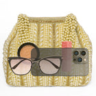 Gold potli bag named Traditional Pearl Cluster Potli Bag, featuring faux pearl detailing and soft fabric texture | Peora
