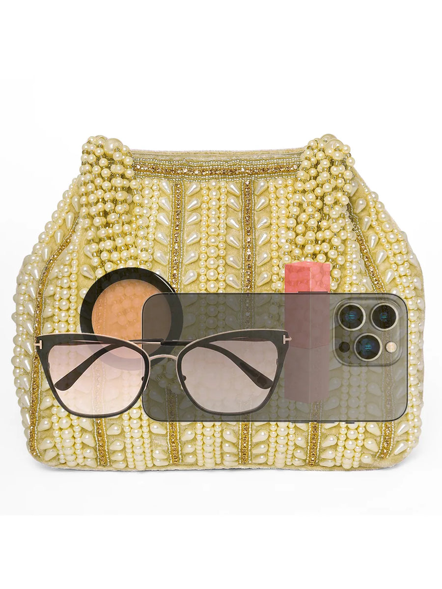 Gold potli bag named Traditional Pearl Cluster Potli Bag, featuring faux pearl detailing and soft fabric texture | Peora
