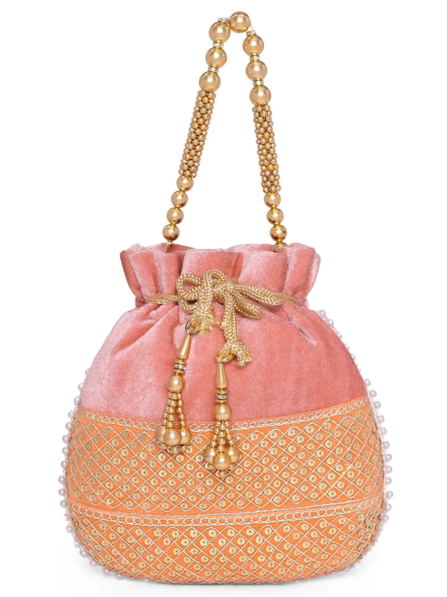 Pink potli bag named Pearl Trim Zari Bead Potli Bag, featuring artificial beads detailing and soft fabric texture | Peora
