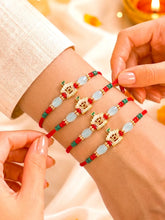 Peora Golden Green Bead Rakhi for Brother | Set of 4