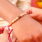 Peora Golden Beaded Rakhi for Brother | Set of 4