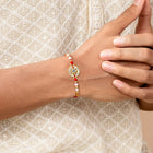 CZ Pearl Studded Chakra Rakhi Combo