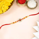 Floral Crystal Rakhi with Rudraksha Beads