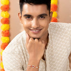 Pearl Studded Floral Crystal Rakhi