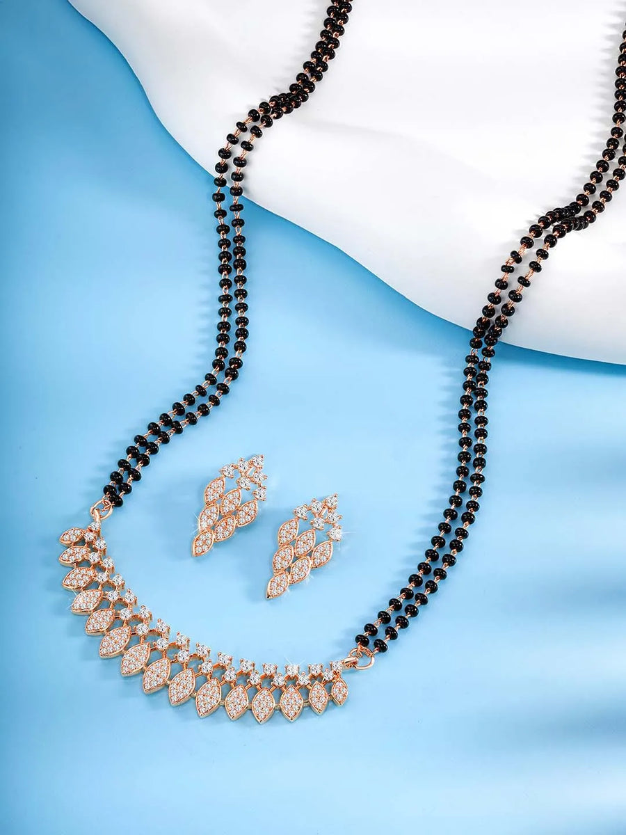 Stunning Radiant CZ Mangalsutra Set. Rose gold CZ mangalsutra set with black beads and matching earrings, in teardrop shape.