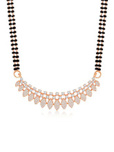 Stunning Radiant CZ Mangalsutra Set. Rose gold CZ mangalsutra set with black beads and matching earrings, in teardrop shape.