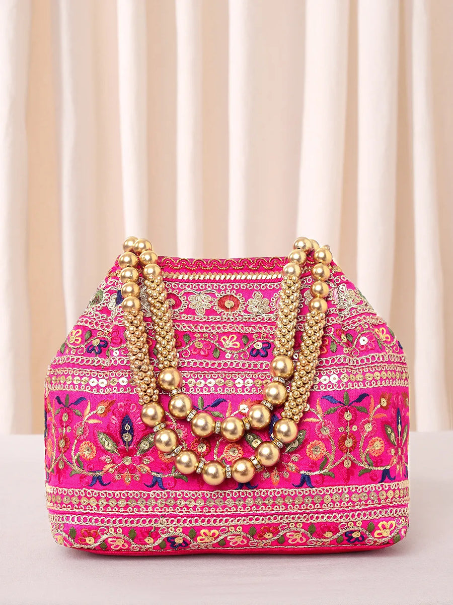 Rani Pink potli bag named Floral Threadwork Potli with Bead Handle, featuring artificial beads detailing and soft fabric texture | Peora
