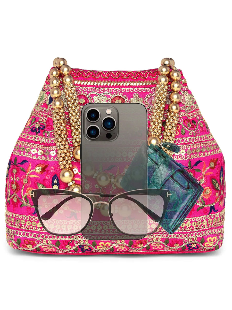 Rani Pink potli bag named Floral Threadwork Potli with Bead Handle, featuring artificial beads detailing and soft fabric texture | Peora
