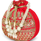 Red potli bag named Drawstring Potli with Zari Embroidery, featuring faux pearl detailing and soft fabric texture | Peora
