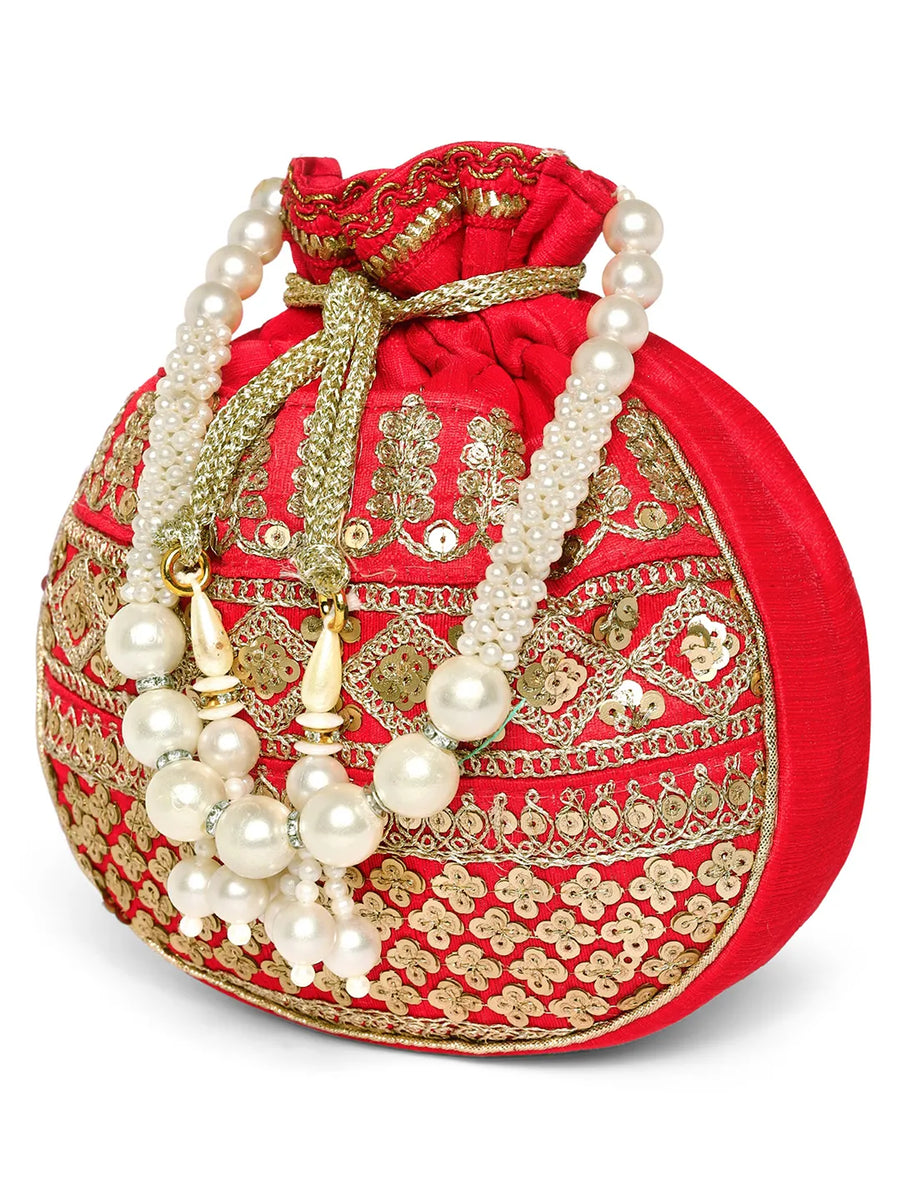 Red potli bag named Drawstring Potli with Zari Embroidery, featuring faux pearl detailing and soft fabric texture | Peora
