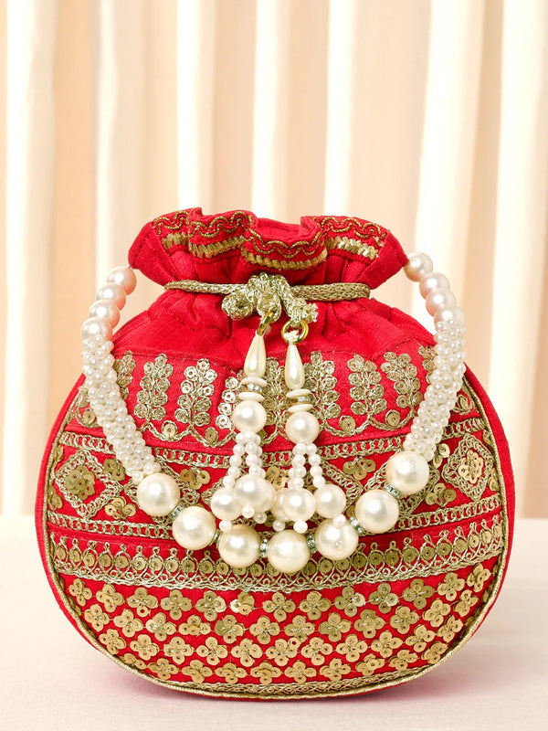 Red potli bag named Drawstring Potli with Zari Embroidery, featuring faux pearl detailing and soft fabric texture | Peora
