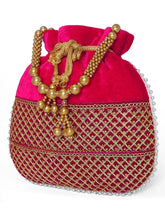 Red potli bag named Pearl Trim Zari Bead Potli Bag, featuring artificial beads detailing and soft fabric texture | Peora
