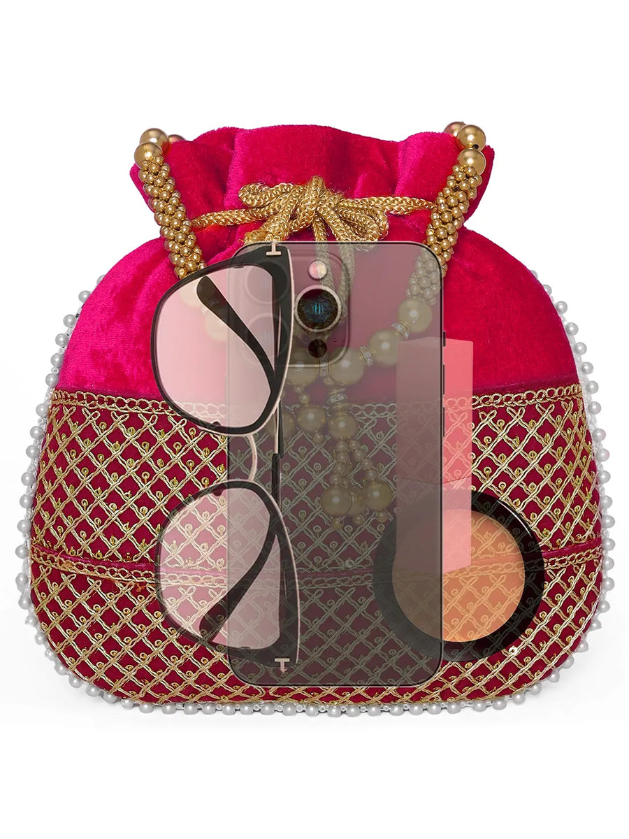 Red potli bag named Pearl Trim Zari Bead Potli Bag, featuring artificial beads detailing and soft fabric texture | Peora
