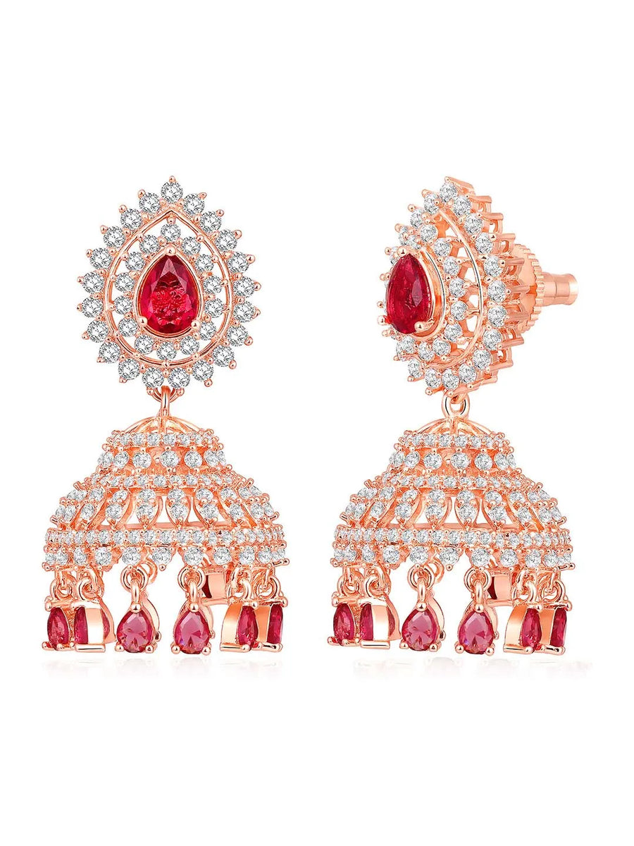 Luxurious Ruby & CZ Dangle Jhumki. A pair of Rose gold plating jhumka earrings with Cubic Zirconia Diamonds & Red rubies. Best for your elegant ethnic looks. 