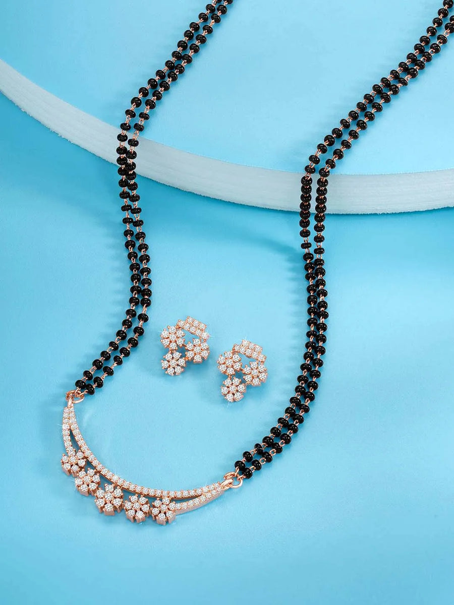 Sparkling CZ Wedding Mangalsutra. A set of sparkling CZ wedding mangalsutra, with earrings, rose gold colour and cubic zirconia stones.