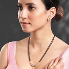 Sparkling CZ Wedding Mangalsutra. A set of sparkling CZ wedding mangalsutra, with earrings, rose gold colour and cubic zirconia stones.