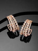 Glamorous Radiant CZ Half Hoop Earrings. A pair of rose gold-colored half hoop earrings with cubic zirconia embellishments. Ideal for casuals & party looks.