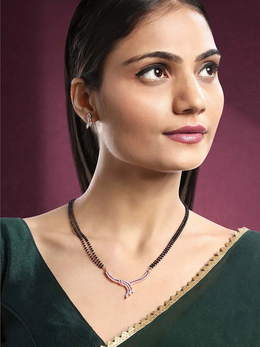 Brilliant Dazzling CZ Mangalsutra Set. Rose gold CZ mangalsutra set with black beads and matching earrings