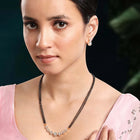 Luxurious Gleaming CZ Mangalsutra Set. Mangalsutra and matching earrings with cubic zirconia stones along with rose gold plating.