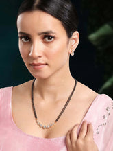 Luxurious Gleaming CZ Mangalsutra Set. Mangalsutra and matching earrings with cubic zirconia stones along with rose gold plating.