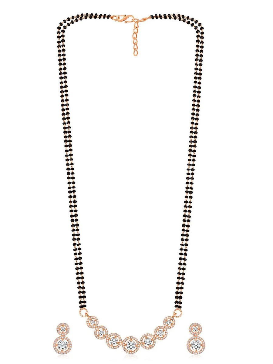 Luxurious Gleaming CZ Mangalsutra Set. Mangalsutra and matching earrings with cubic zirconia stones along with rose gold plating.