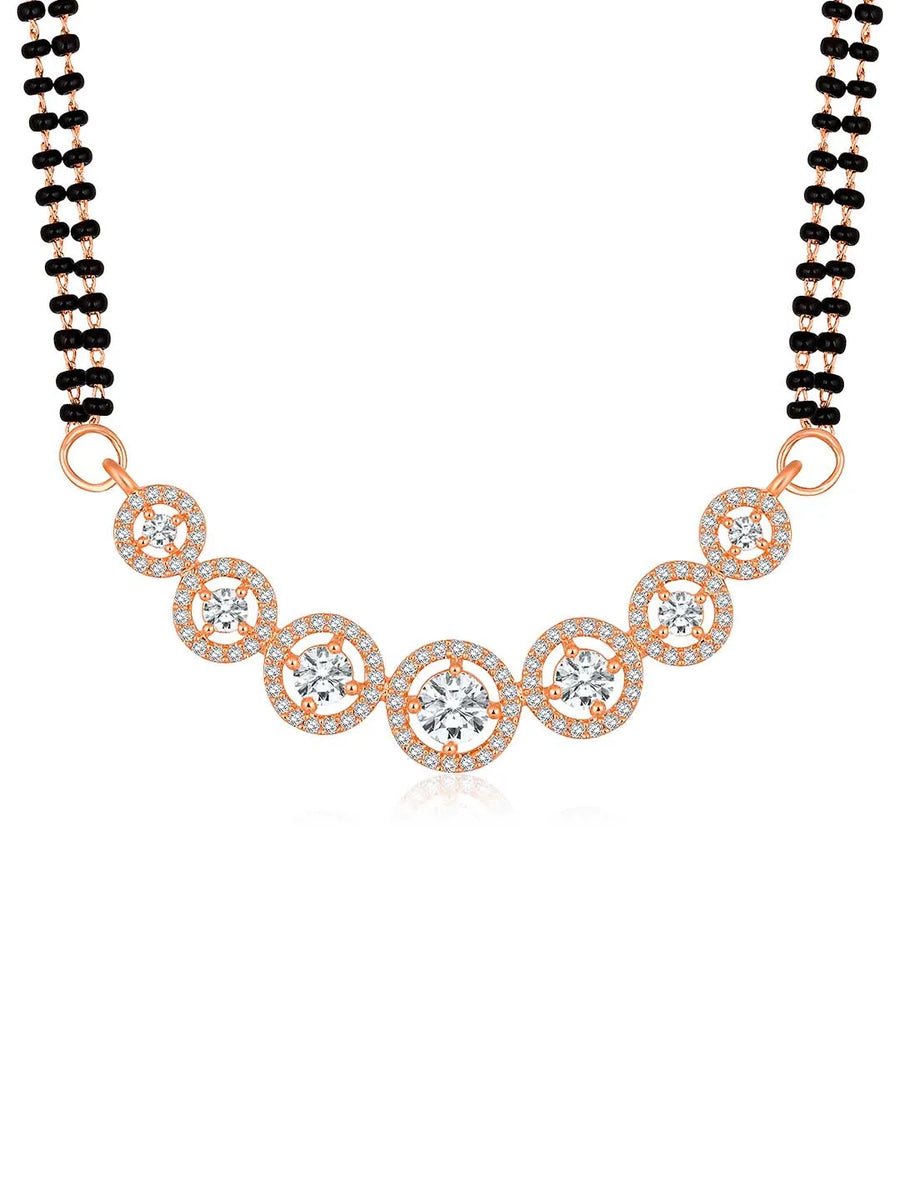 Luxurious Gleaming CZ Mangalsutra Set. Mangalsutra and matching earrings with cubic zirconia stones along with rose gold plating.