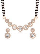 Luxurious Gleaming CZ Mangalsutra Set. Mangalsutra and matching earrings with cubic zirconia stones along with rose gold plating.