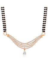 CZ Studded Traditional Mangalsutra Set. A traditional mangalsutra set with black beads and rose gold-color plating, zirconia stones, & matching earrings.