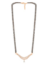 CZ Studded Traditional Mangalsutra Set. A traditional mangalsutra set with black beads and rose gold-color plating, zirconia stones, & matching earrings.