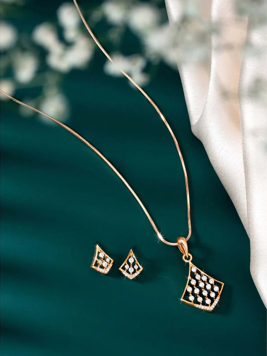 Sparkling Rhombus CZ Pendant Set by Peora. Rose gold-colored pendant set with a rhombus-shaped design with earrings & CZ stones.