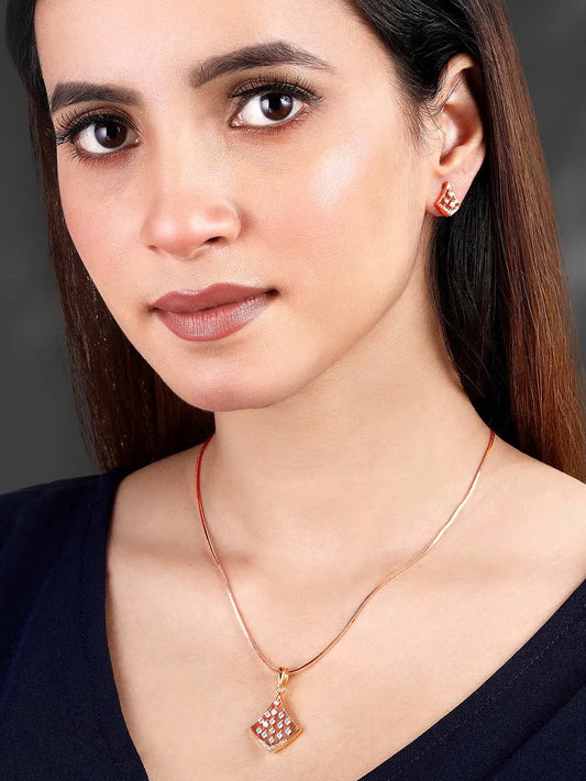 Sparkling Rhombus CZ Pendant Set by Peora. Rose gold-colored pendant set with a rhombus-shaped design with earrings & CZ stones.