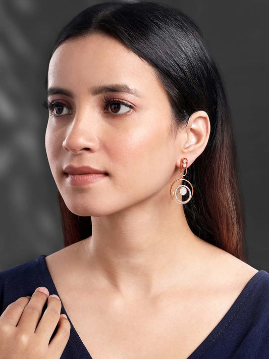 Chic Radiant Roundness CZ Earrings. Rose gold-plated dangler earrings with Cz stones, in circular shape.
