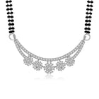 Sparkling CZ Wedding Mangalsutra. A set of sparkling CZ wedding mangalsutra, with earrings, silver colour and cubic zirconia stones.