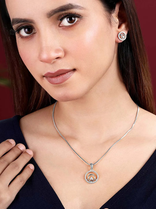 Elegant CZ Round Pendant Orbit Set. Silver-plated pendant necklace and a pair of earrings with a round pendant & CZ stones.