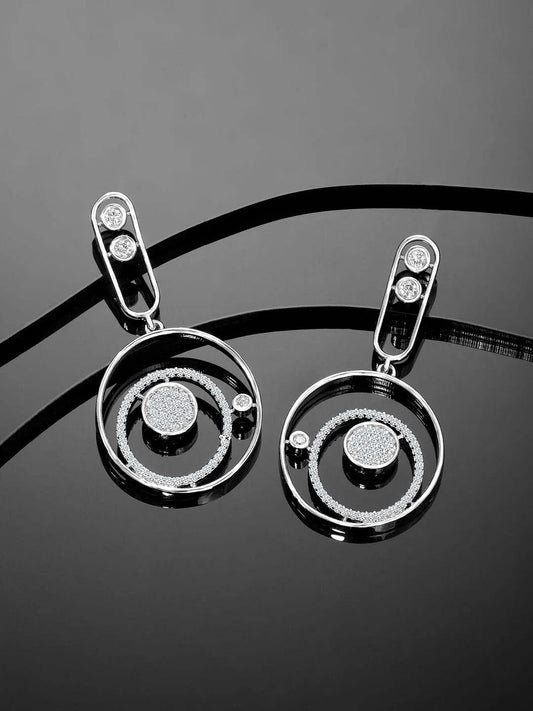 Chic Radiant Roundness CZ Earrings. Silver-plated dangler earrings with Cz stones, in circular shape.