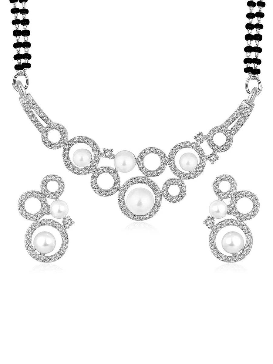 Beautiful Shimmering CZ Mangalsutra Set. A set of black beaded Mangalsutra with silver-colour and geometric patterns, with pearls, CZ stones.