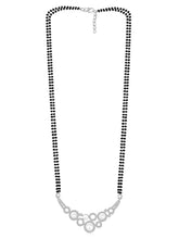 Beautiful Shimmering CZ Mangalsutra Set. A set of black beaded Mangalsutra with silver-colour and geometric patterns, with pearls, CZ stones.