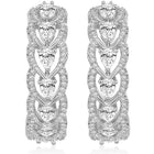 Sparkle & Shine CZ Hoop Earrings. Silver-plated hoop earrings with cubic zirconia stones from Peora.