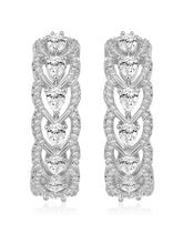 Sparkle & Shine CZ Hoop Earrings. Silver-plated hoop earrings with cubic zirconia stones from Peora.