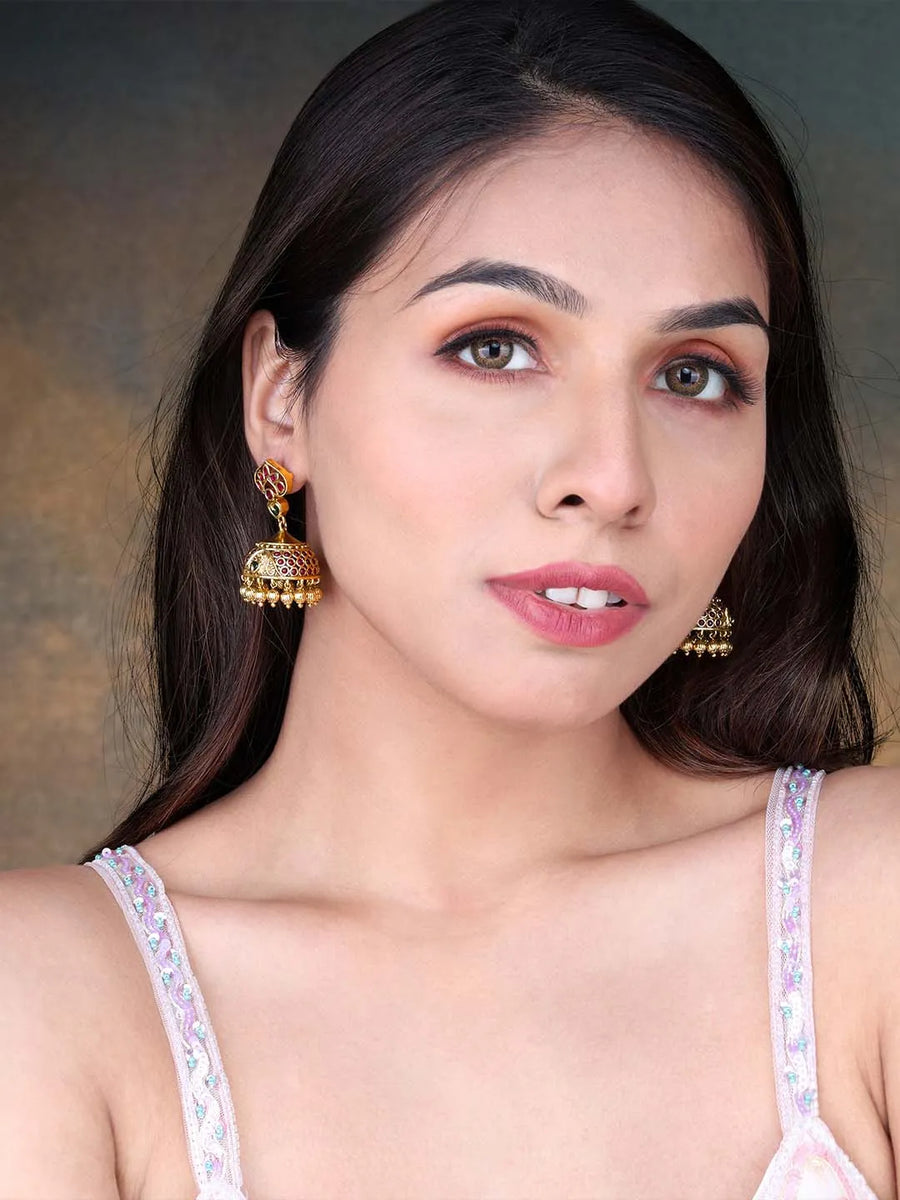 Traditional Style Golden Jhumki Earrings. Stunning  Golden Harmony Dangle Earrings. Gold-plated Jhumki earrings with green and rani pink stones, and hanging beads – traditional festive jewellery.