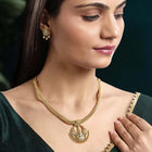 Radiant Elegance Golden Necklace Set. A golden necklace set with intricate designs, consisting of necklace and matching earrings.