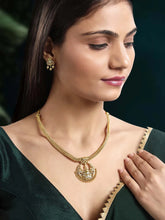 Radiant Elegance Golden Necklace Set. A golden necklace set with intricate designs, consisting of necklace and matching earrings.