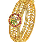 Traditional Kada with Intricate Design. Gold plated with green, white & purple stones. It has detailed design with screw opening. Best temple jewellery.
