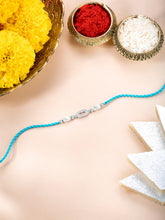 Close-up of Sterling Silver Rakhi Weave Design Band featuring teal green thread, nan work, and rhodium plating – ideal for Raksha Bandhan | Peora
