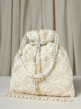 Cream potli bag named Heavy Zari Sequin Wedding Potli, featuring artificial beads detailing and soft fabric texture | Peora

