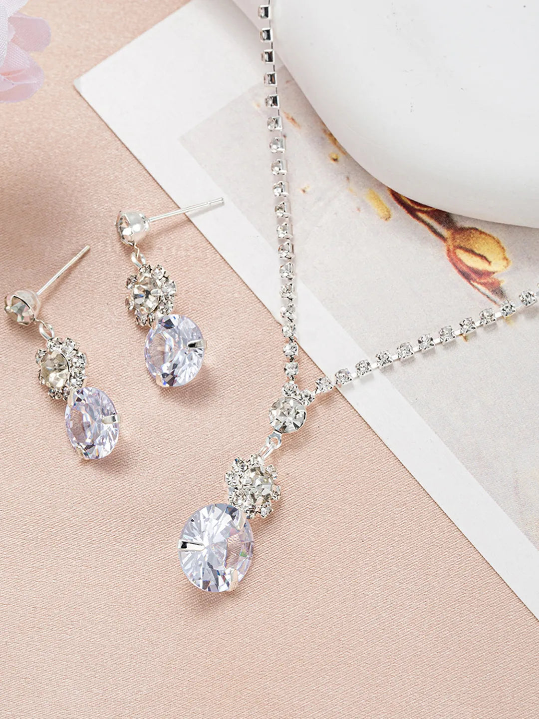 White necklace earrings set crafted from alloy, adorned with cubic zirconia & crystals for an elegant, timeless look | Peora
